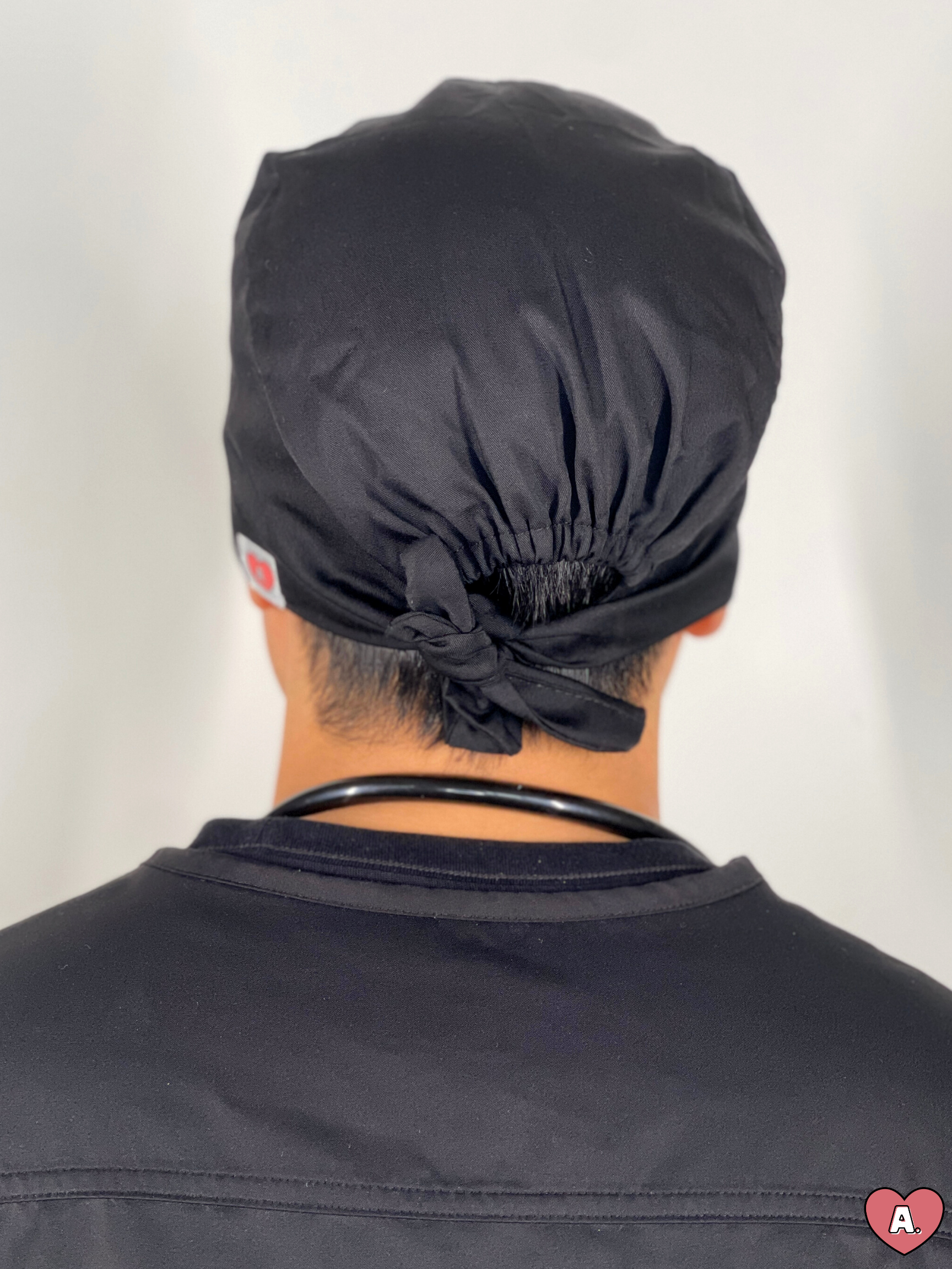 {{ scrub_cap }} - {{ acute_apparel }}
